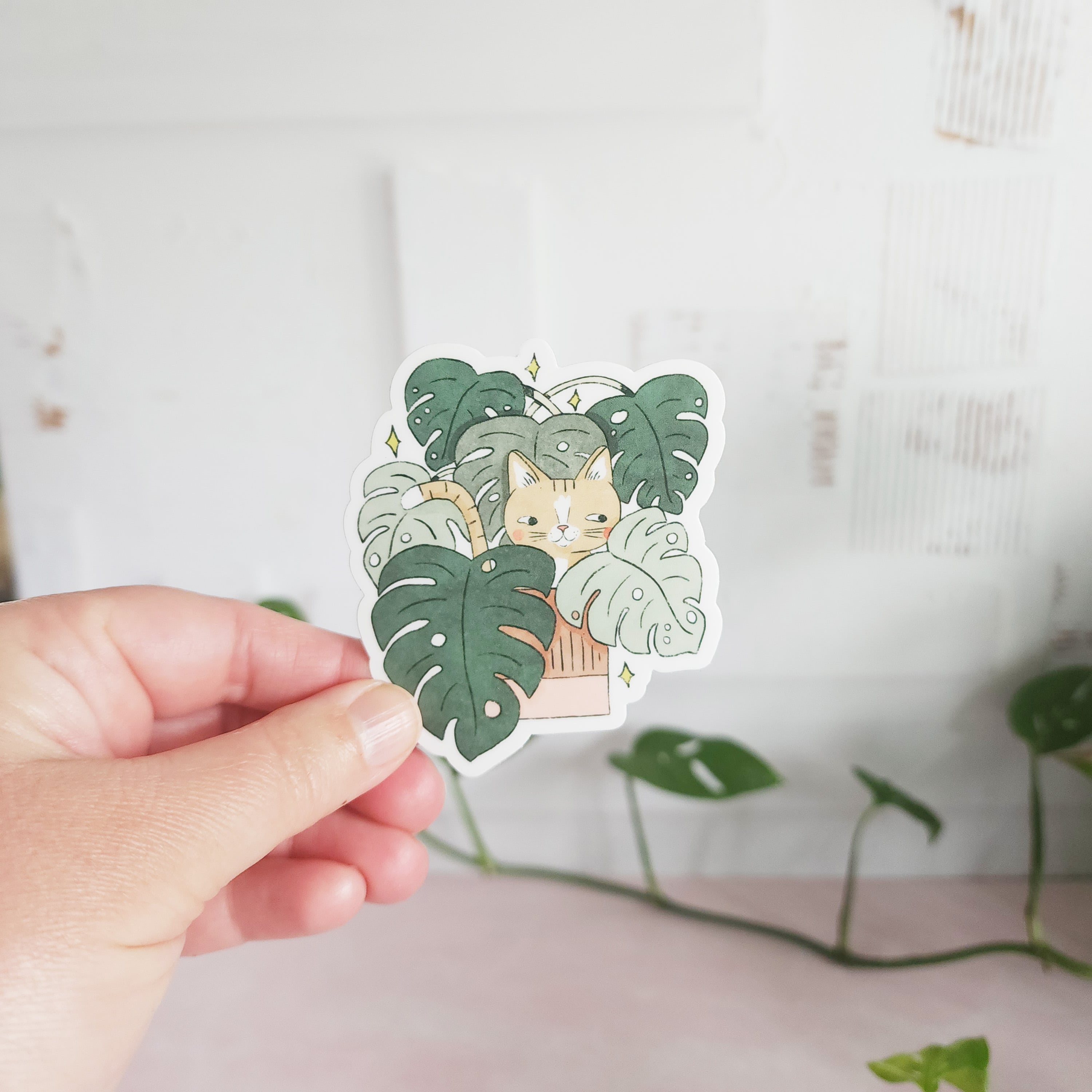 cat in monstera vinyl sticker