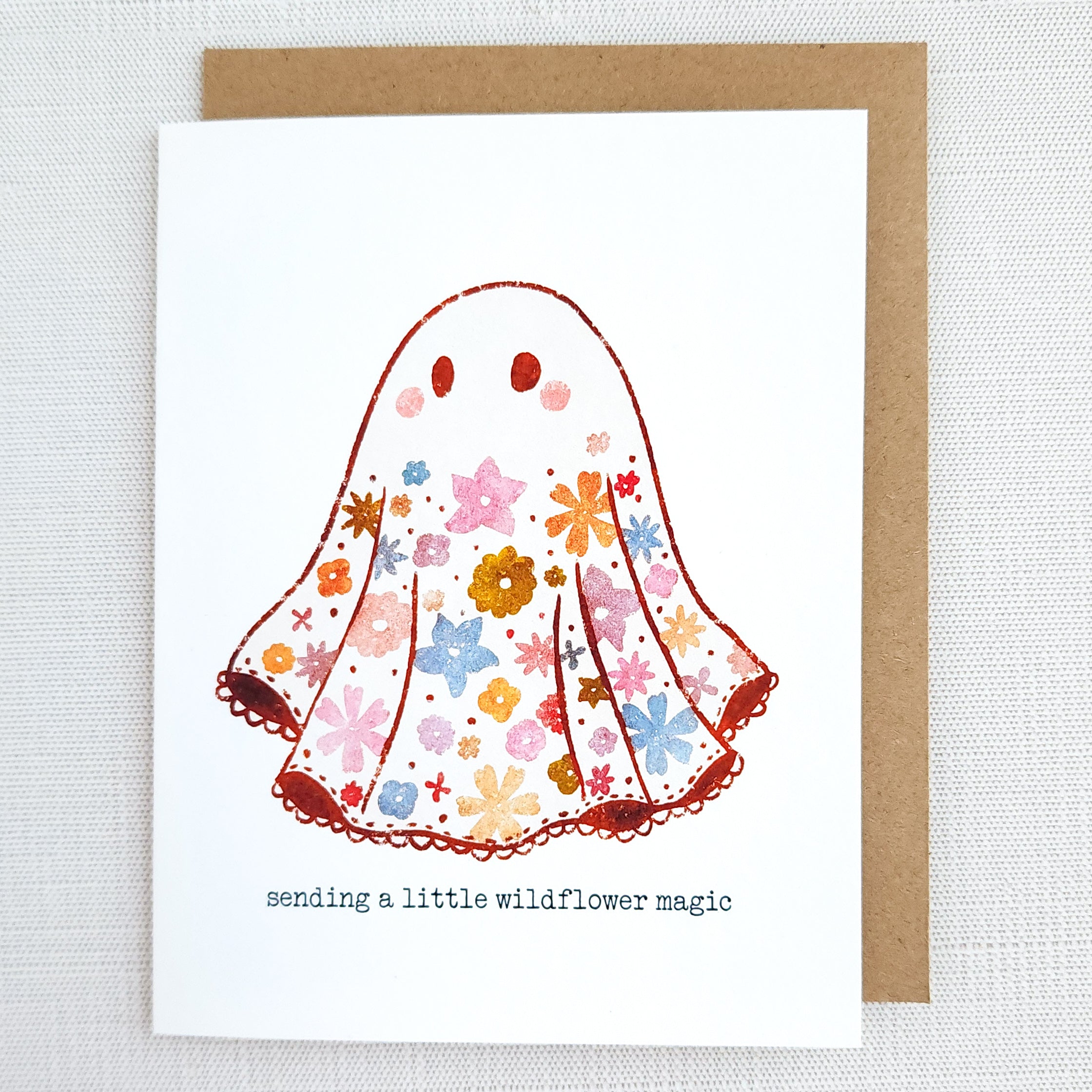 Greeting card with a floral ghost design and text &