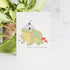 Card with a frog illustration and text &