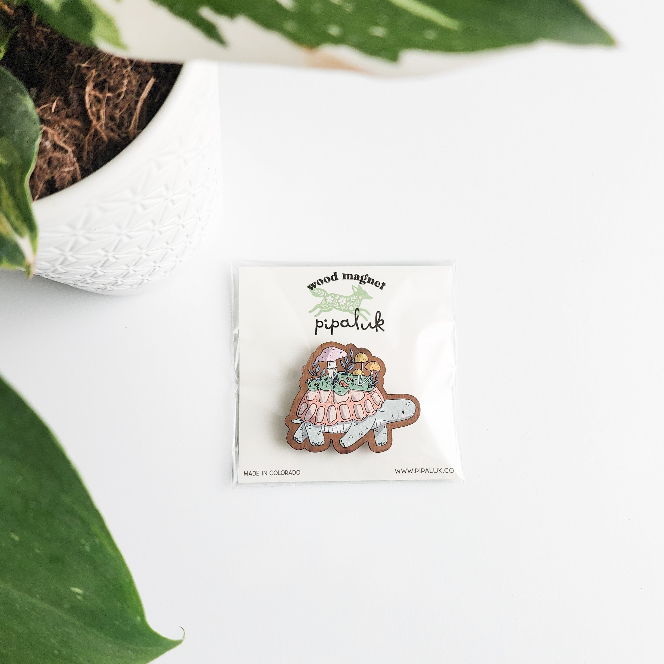 Wooden turtle magnet on a card with &