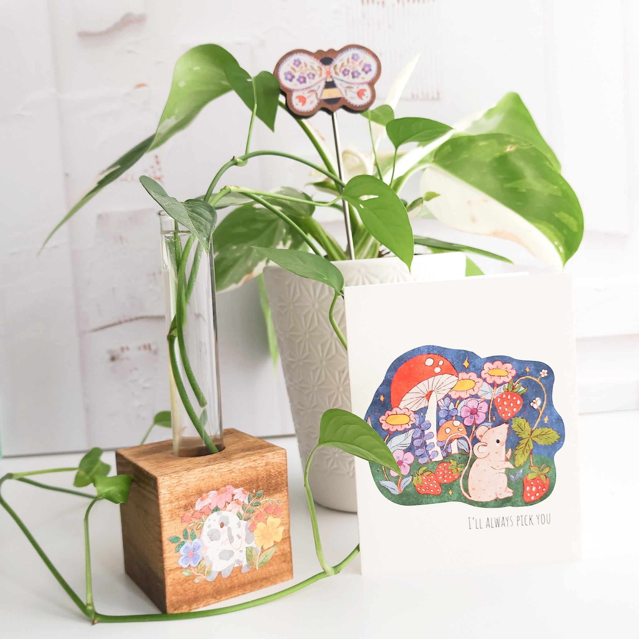bunny propagation with a plant cutting, floral bee houseplant flair in a plant and a strawberry mouse card on a white background