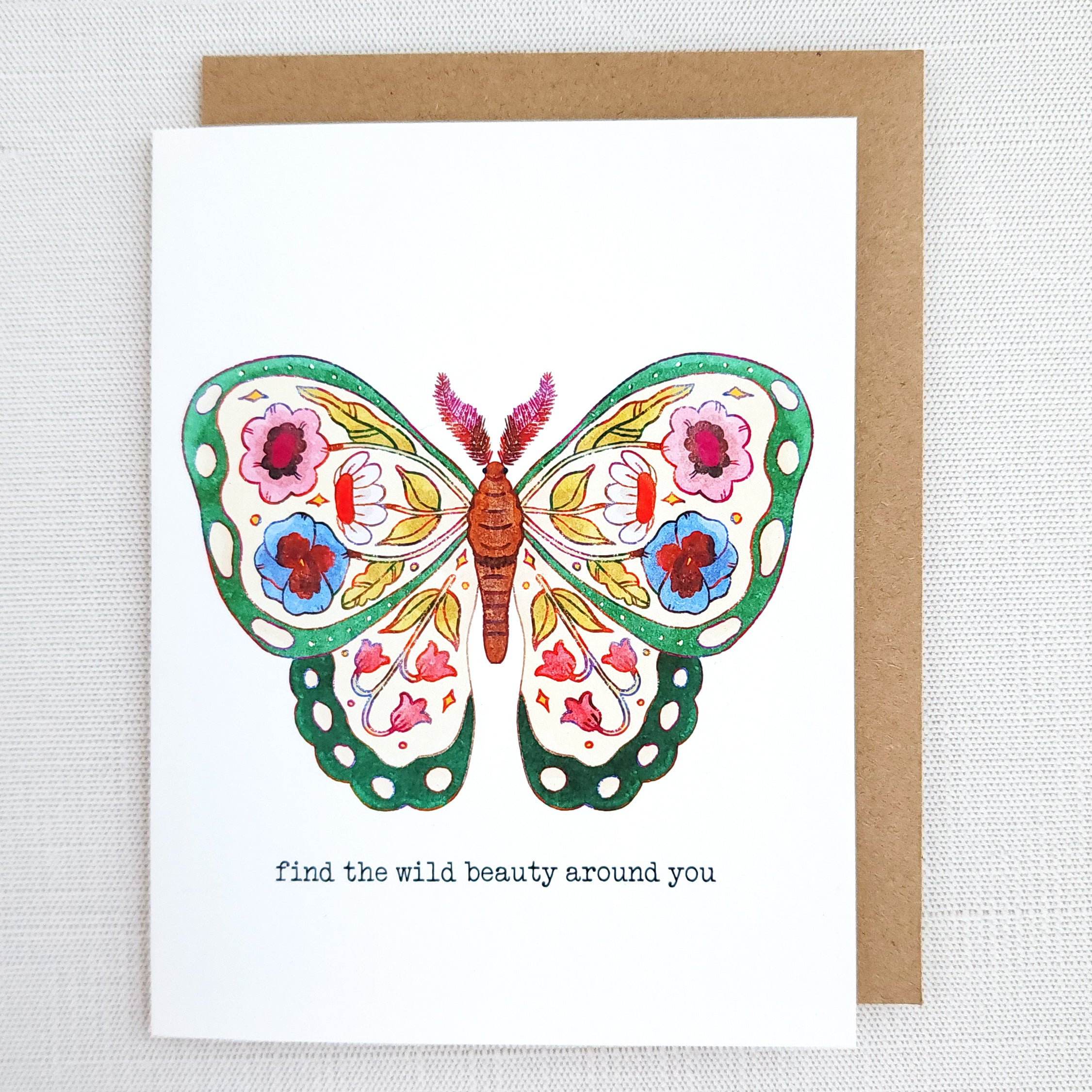 Greeting card with a colorful butterfly illustration and text on a white background