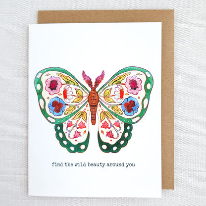 Greeting card with a colorful butterfly illustration and text on a white background