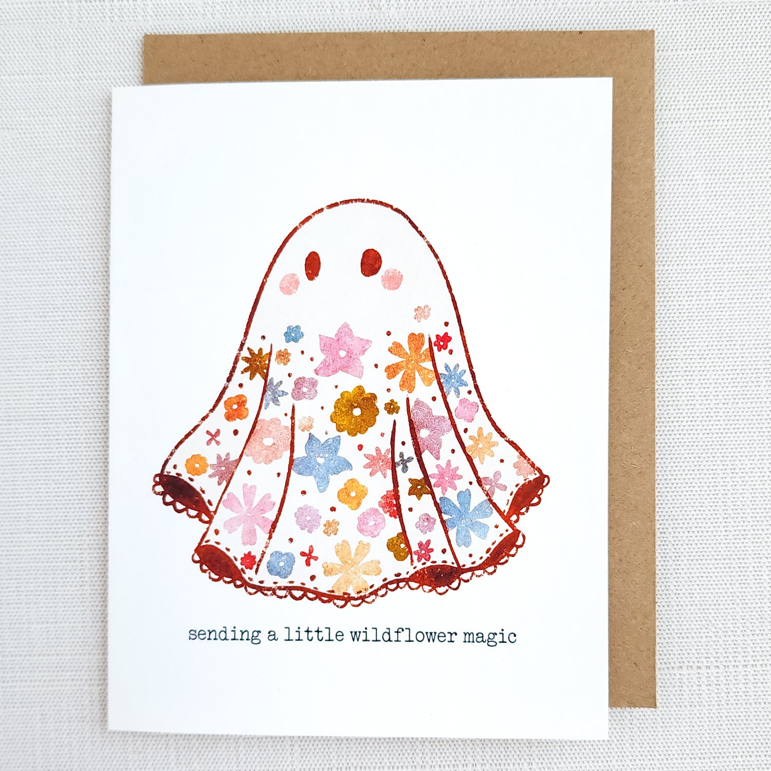 Greeting card with a floral ghost design and text &