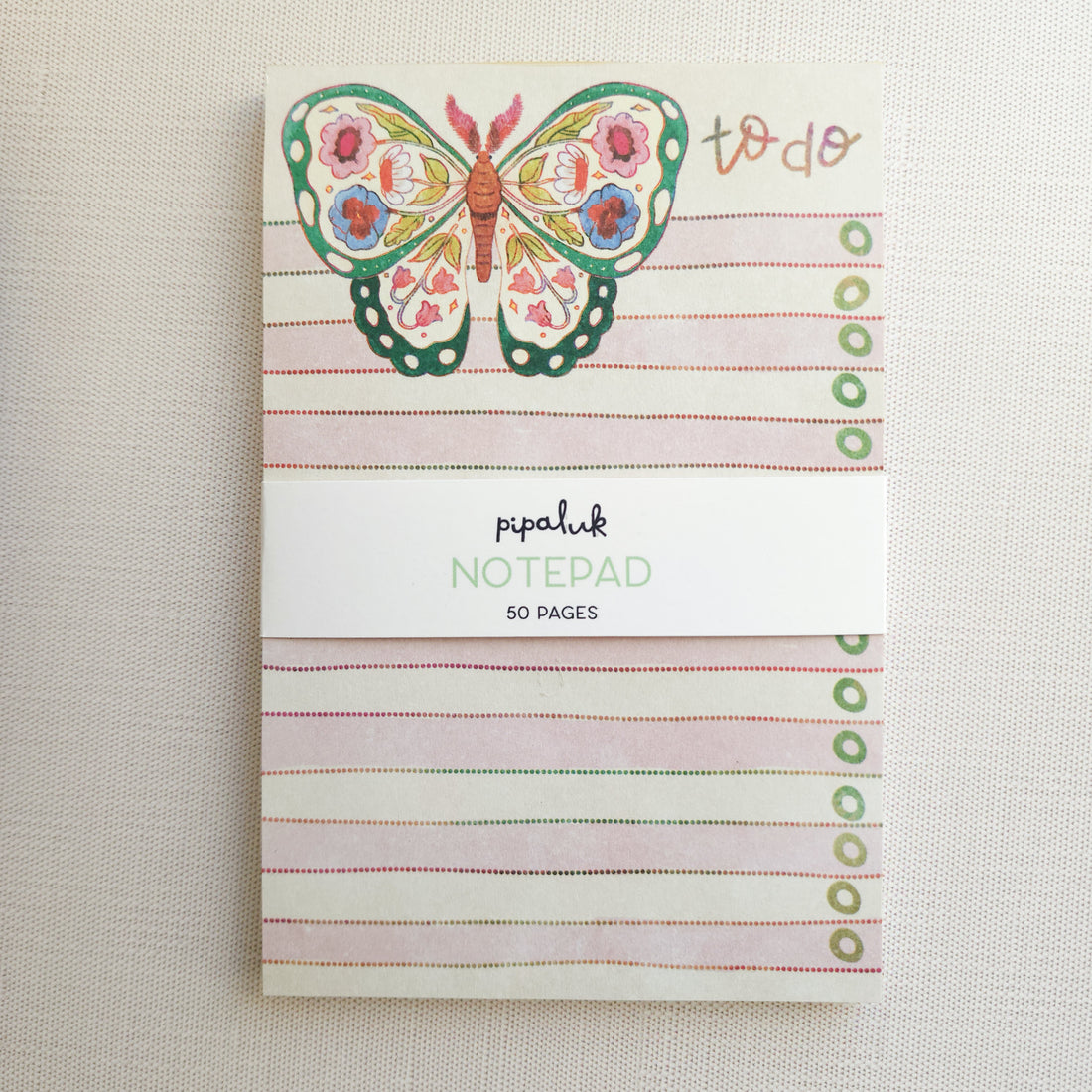 Notepad with butterfly design and &