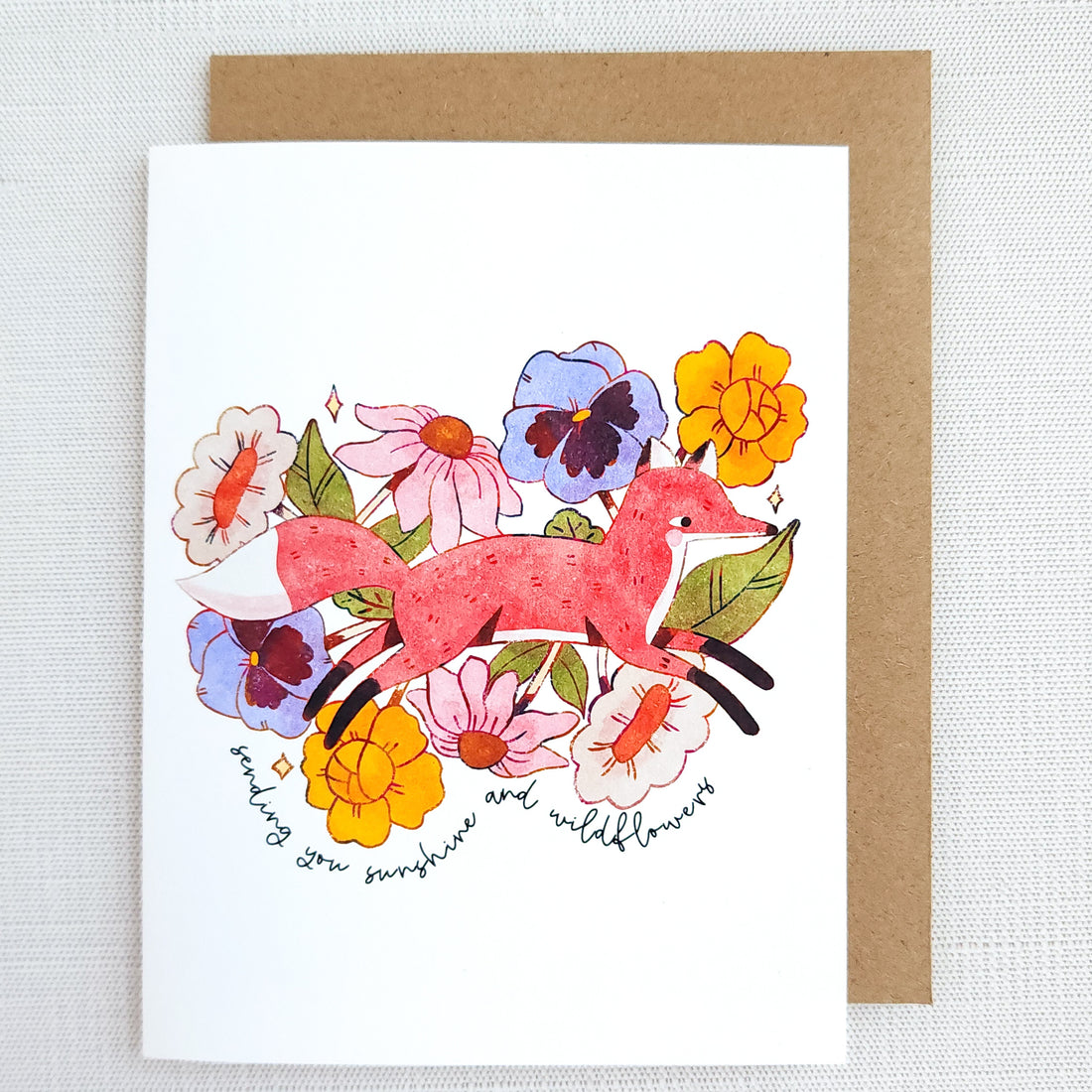 Greeting card with a fox and flowers on a white background