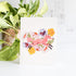 Card with a fox and floral design on a white background