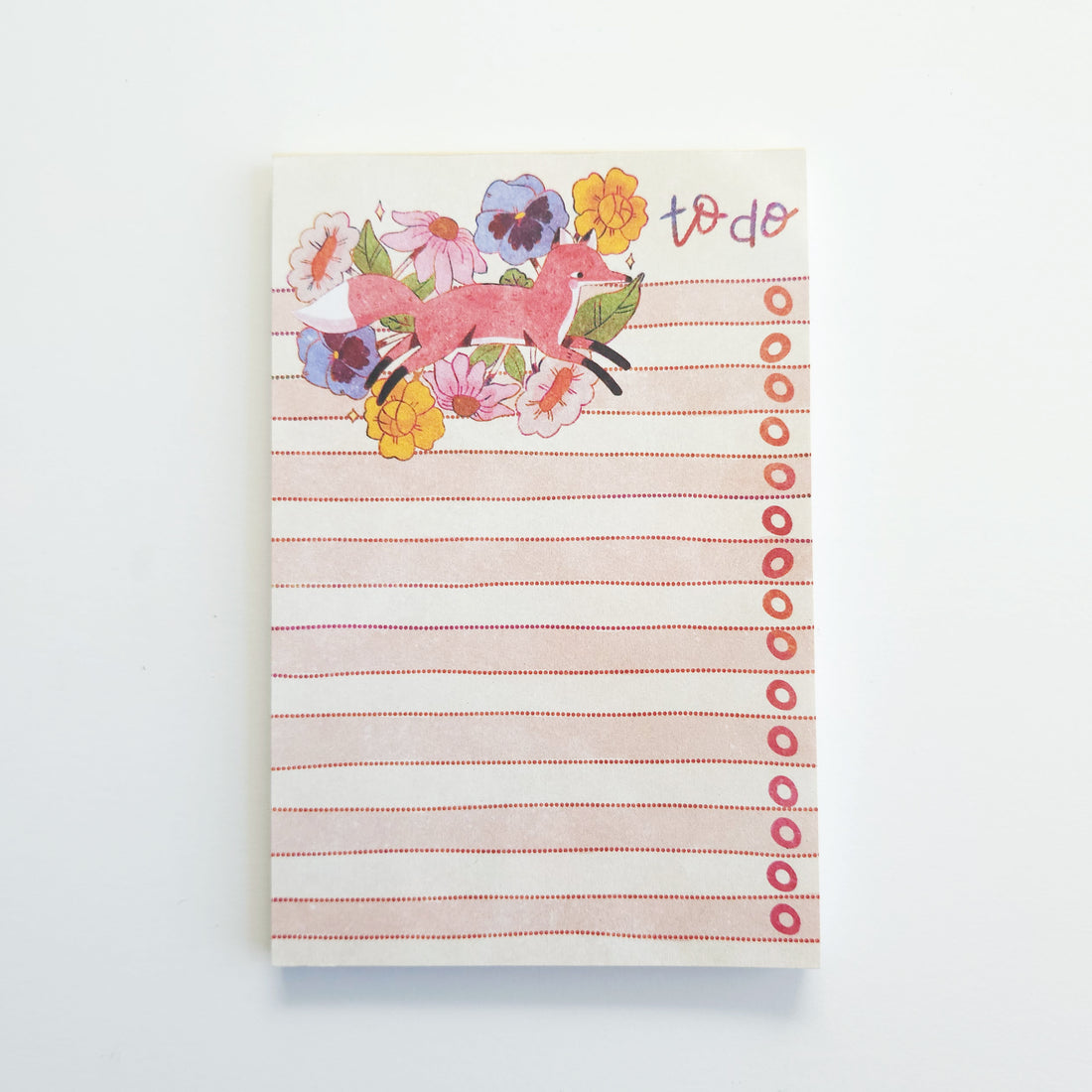to do list with a fox and floral design on the cover, on a white background