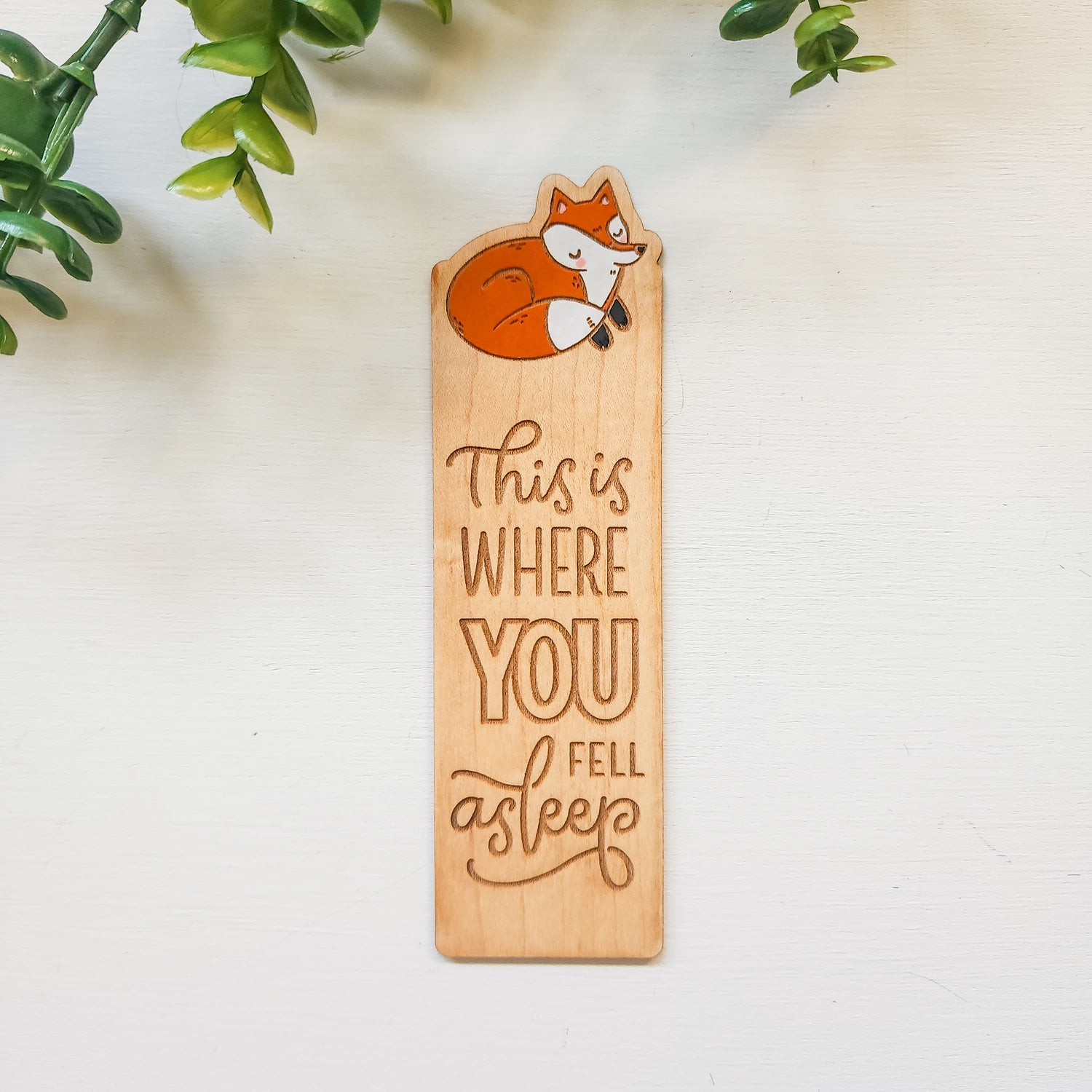 painted wooden fox bookmark that says this engraved with this is where you fell asleep