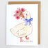 Card with a goose flowers and a blue bow, and the words honk and hello on a textured white background