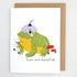 Greeting card with a frog illustration and text be your weird beautiful self on a white background