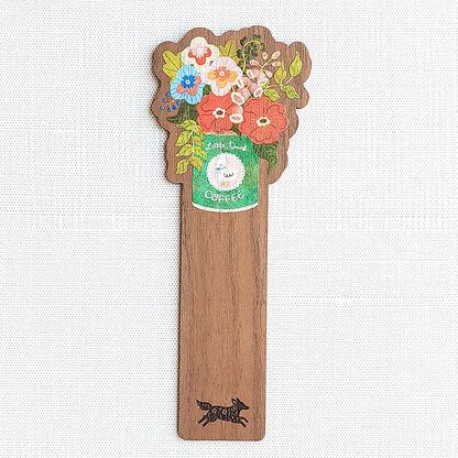 Walnut wood bookmark with a vintage-inspired Little Duck Coffee can filled with cheerful pink, yellow, and blue garden blooms on a neutral background
