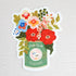 Waterproof vinyl sticker featuring an illustrated Little Duck Coffee can repurposed as a vase, filled with colorful garden flowers on a neutral background