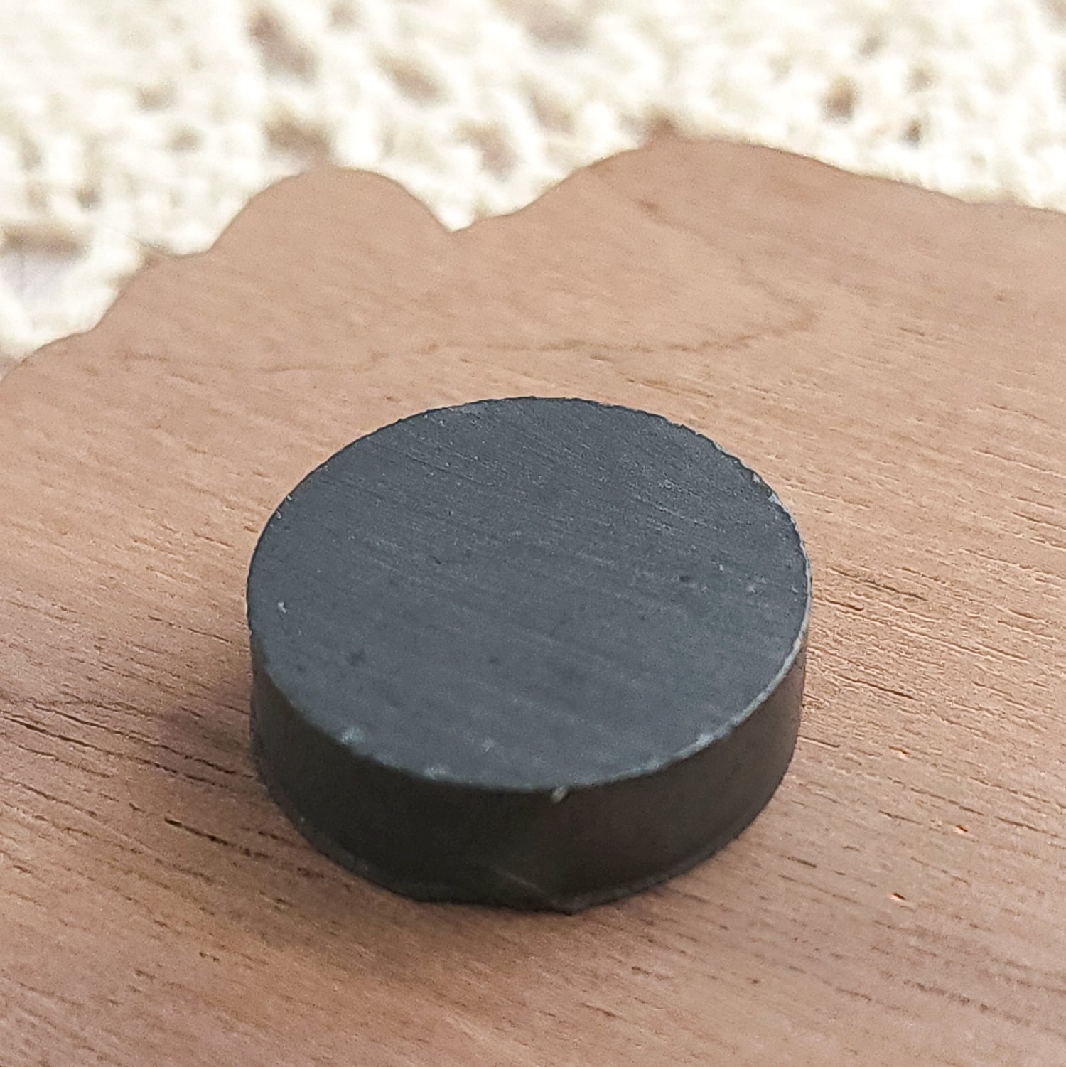 ceramic magnet on a wood