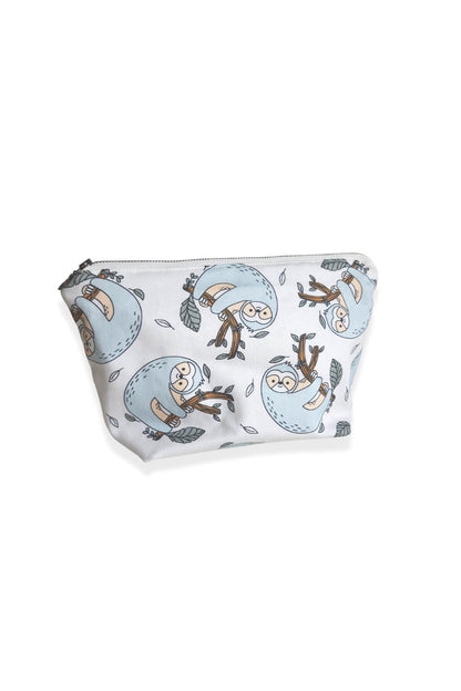 cream zipper top pouch with cute orange and blue sloths hanging from an orange branch with green leaves